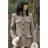 Celebrity Traitors Claudia Winkleman Grey Coat