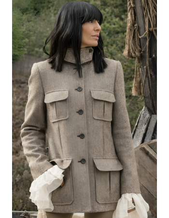 Celebrity Traitors Claudia Winkleman Grey Coat