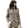 Celebrity Traitors Claudia Winkleman Grey Coat